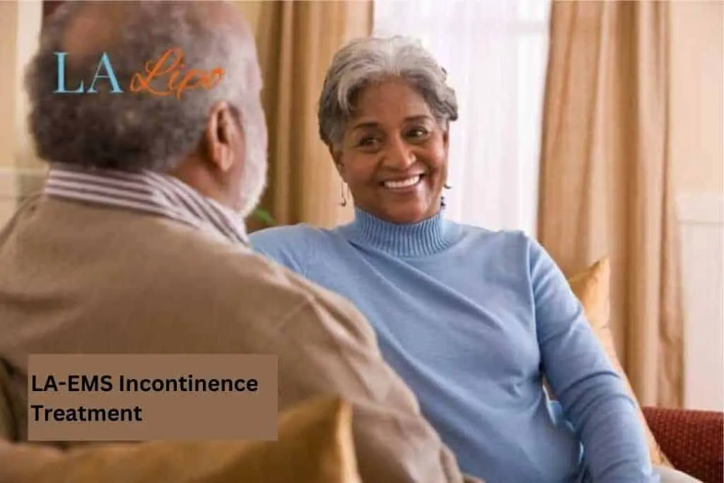 Couple sat smiling at each other - LA-EMS treatment Cheadle